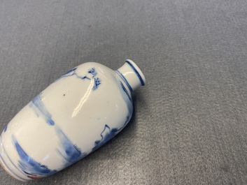 A small Chinese blue, white and copper-red vase, 19th C.