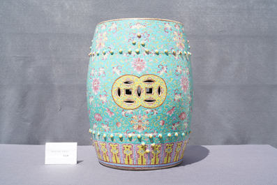 A pair of Chinese turquoise-ground famille rose garden seats, 19th C.