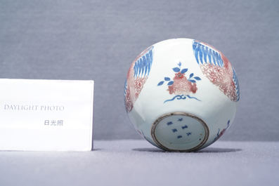 A Chinese blue, white and copper-red 'phoenixes' water pot, Kangxi mark, 19th C.