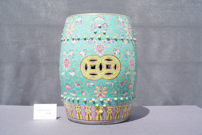 A pair of Chinese turquoise-ground famille rose garden seats, 19th C.