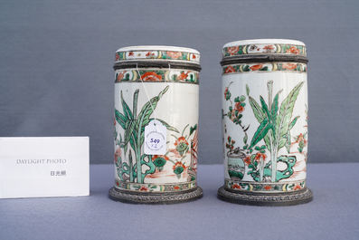 A pair of Chinese silver-mounted cylindrical famille verte covered jars, Kangxi