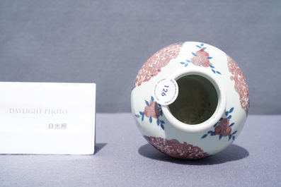 A Chinese blue, white and copper-red 'phoenixes' water pot, Kangxi mark, 19th C.