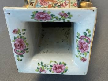 A pair of Chinese square famille rose celadon-ground vases on gilt bronze feet, 19th C.