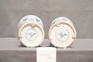 A large Chinese blue and white five-piece garniture with floral and landscape panels, Kangxi