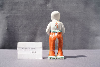 A Chinese famille verte water dropper modelled as a peeing boy, Qianlong