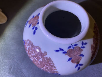 A Chinese blue, white and copper-red 'phoenixes' water pot, Kangxi mark, 19th C.