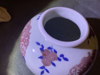 A Chinese blue, white and copper-red 'phoenixes' water pot, Kangxi mark, 19th C.