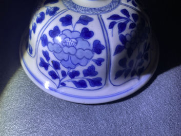 A Chinese blue and white 'horseriders' vase and cover, Kangxi
