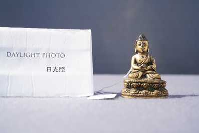 Une figure de Bouddha en bronze dor&eacute;, Sino-Tibet, Ming