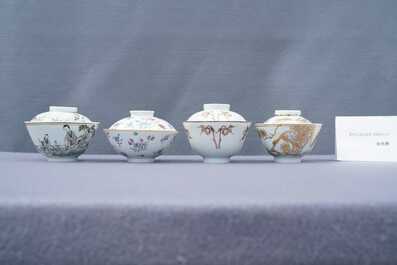 Eight Chinese famille rose and iron-red covered bowls with two stands, 19th C.