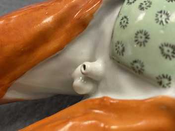 A Chinese famille verte water dropper modelled as a peeing boy, Qianlong