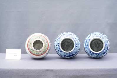 A pair of Chinese blue and white vases and a famille rose jar and cover, 19/20th C.
