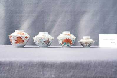 Eight Chinese famille rose and iron-red covered bowls with two stands, 19th C.