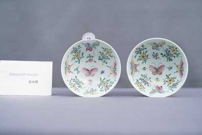 A pair of Chinese famille rose rice grain pattern 'butterfly' bowls, Qianlong mark, 19th C.