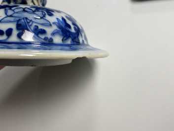 A pair of Chinese blue and white vases and a famille rose jar and cover, 19/20th C.