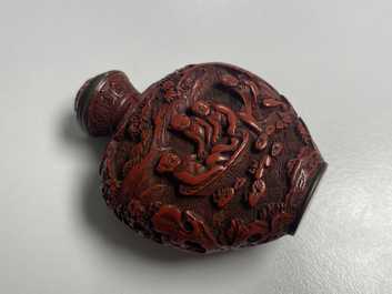 A Chinese carved red cinnabar lacquer 'boys at play' snuff bottle, imperial workshops, Qianlong/Jiaqing