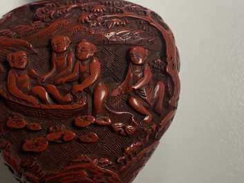 A Chinese carved red cinnabar lacquer 'boys at play' snuff bottle, imperial workshops, Qianlong/Jiaqing