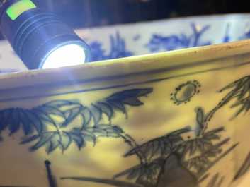 A large Chinese blue and white 'river landscape' bowl, Ming