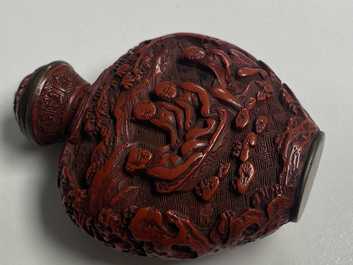 A Chinese carved red cinnabar lacquer 'boys at play' snuff bottle, imperial workshops, Qianlong/Jiaqing