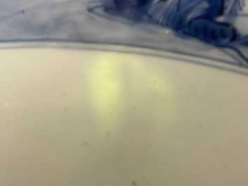 A large Chinese blue and white 'river landscape' bowl, Ming