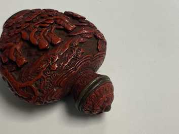 A Chinese carved red cinnabar lacquer 'boys at play' snuff bottle, imperial workshops, Qianlong/Jiaqing