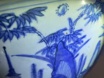 A large Chinese blue and white 'river landscape' bowl, Ming