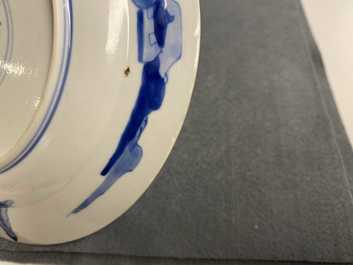 Five Chinese blue and white figurative plates, Kangxi and Chenghua marks, Kangxi
