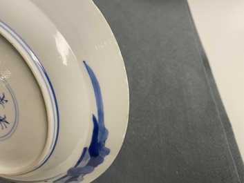 Five Chinese blue and white figurative plates, Kangxi and Chenghua marks, Kangxi