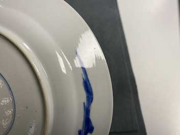 Five Chinese blue and white figurative plates, Kangxi and Chenghua marks, Kangxi