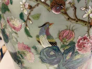 A pair of large Chinese Canton famille rose celadon-ground vases and covers, 19th C.