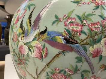 A pair of large Chinese Canton famille rose celadon-ground vases and covers, 19th C.