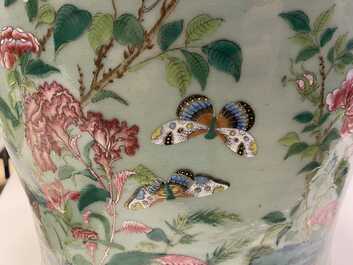 A pair of large Chinese Canton famille rose celadon-ground vases and covers, 19th C.