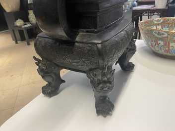 A large Chinese bronze censer and cover, Ming