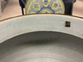 A pair of large Chinese Canton famille rose celadon-ground vases and covers, 19th C.