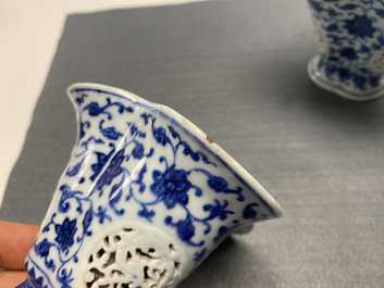 A pair of rare Chinese blue and white double-walled reticulated trilobed libation cups, Qianlong