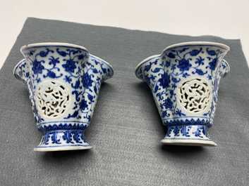 A pair of rare Chinese blue and white double-walled reticulated trilobed libation cups, Qianlong