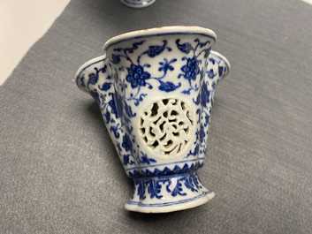 A pair of rare Chinese blue and white double-walled reticulated trilobed libation cups, Qianlong