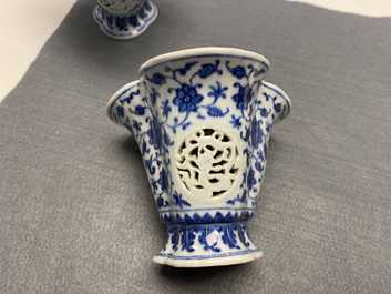 A pair of rare Chinese blue and white double-walled reticulated trilobed libation cups, Qianlong