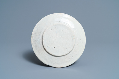 A blue and white Portuguese armorial plate, dated 1650