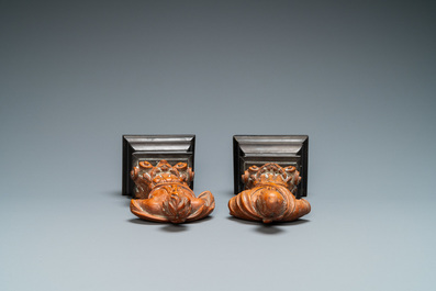 A pair of boxwood busts of a saint on an ebony veneer base, 17th C.