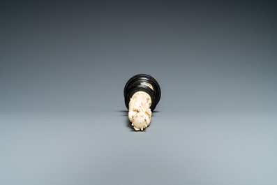 An ivory figure of a female saint holding a book, 19th C.