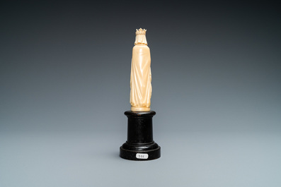 An ivory figure of a female saint holding a book, 19th C.