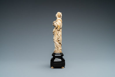 An ivory figure of a Madonna on wooden stand, Flanders or Germany, 17th C.