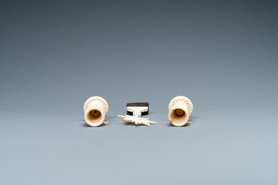 A small ivory crucifix monstrance and a pair of small bone candlesticks, Dieppe, France, 19th C.
