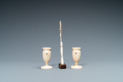 A small ivory crucifix monstrance and a pair of small bone candlesticks, Dieppe, France, 19th C.