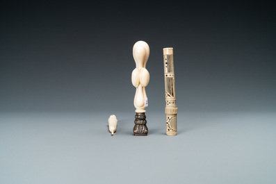 An ivory 'Stanhope' miniature umbrella with microscopical views on Paris, a seal stamp and a bone needle case, 19th C.