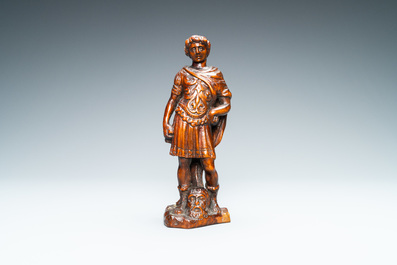 Een palmhouten figuur van David met het hoofd van Goliath, 17e eeuw