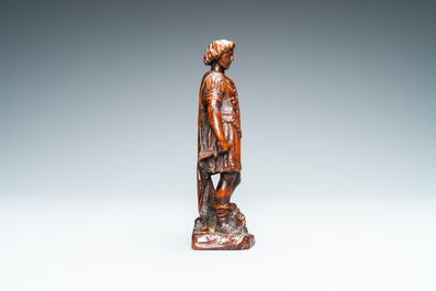 Een palmhouten figuur van David met het hoofd van Goliath, 17e eeuw