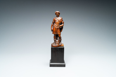 Een palmhouten figuur van David met het hoofd van Goliath, 17e eeuw