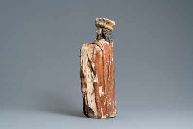 A polychromed limestone figure of a king or a prophet, France, 15th C.